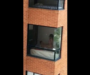 Spycam intercourse vid filmed thru dormitory balcony window
