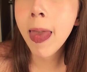 Timid girl flashes her lengthy tongue