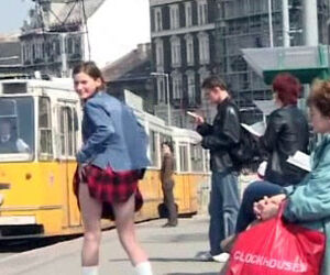 Shameless teenage mega-slut elevates her mini-skirt at the